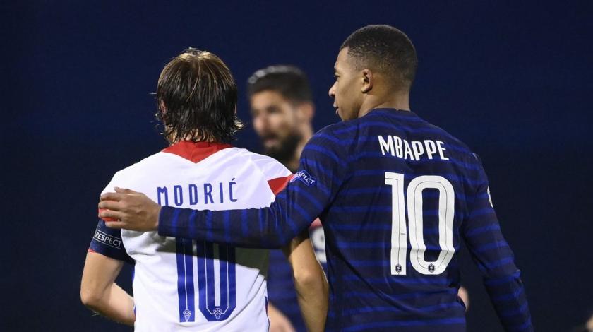 62068828-luka-modric-kylan-mbappe.jpg